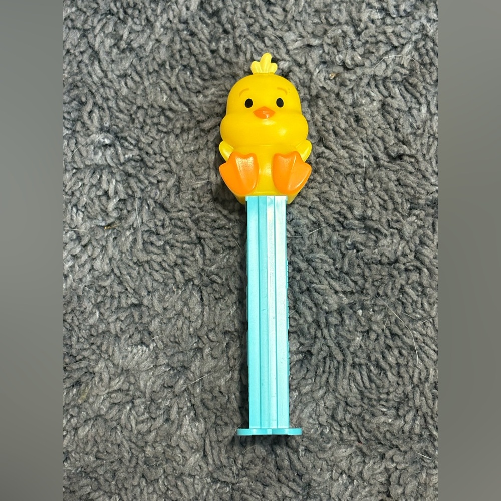 NWOT blue PEZ dispenser with a yellow chick on top